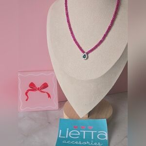 Elegant Pink Necklace with Green Pendant